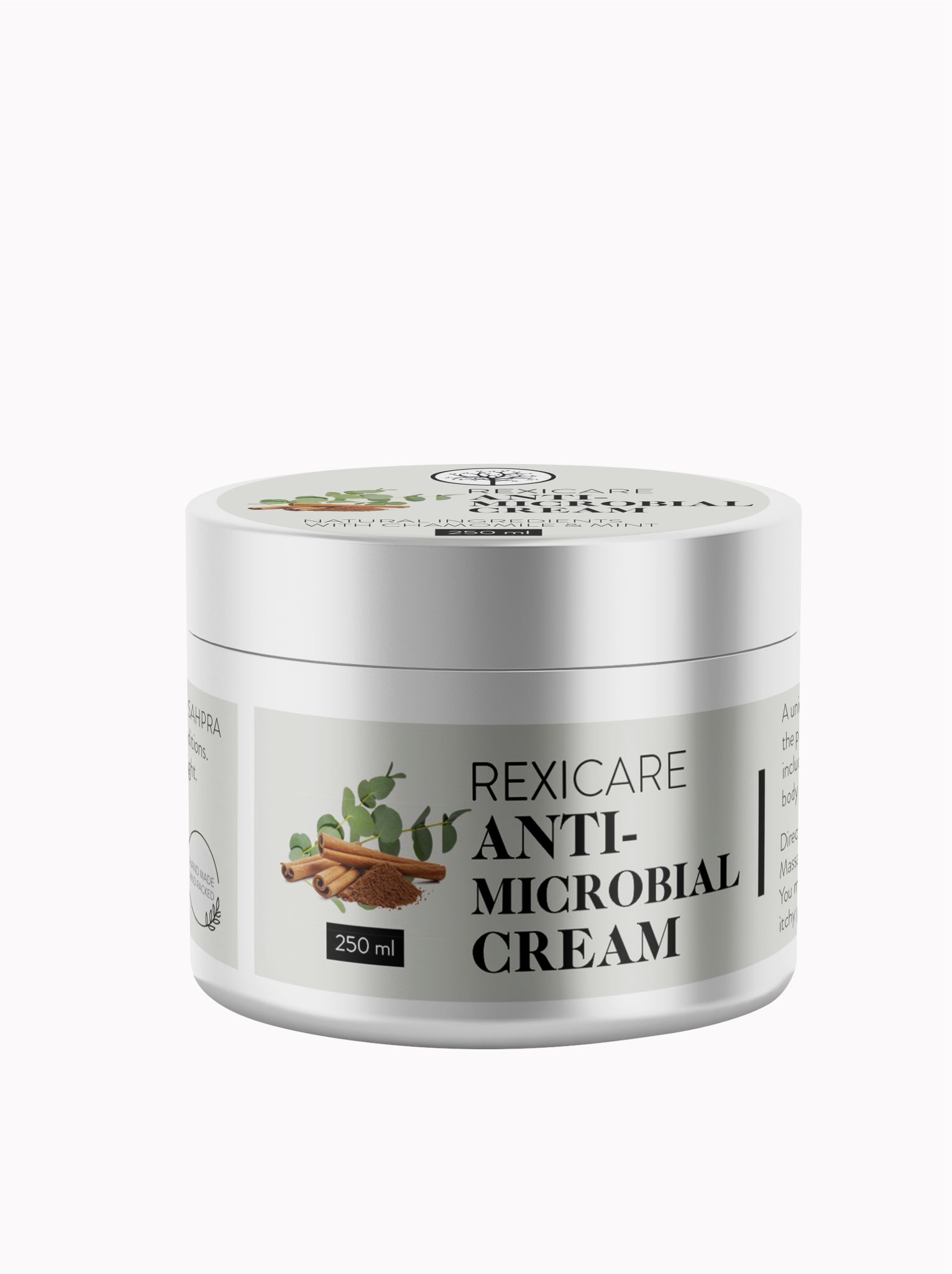A silver jar of REXICARE Anti-Microbial Cream with a white label, featuring a graphic of cinnamon and eucalyptus, set against a plain white background.